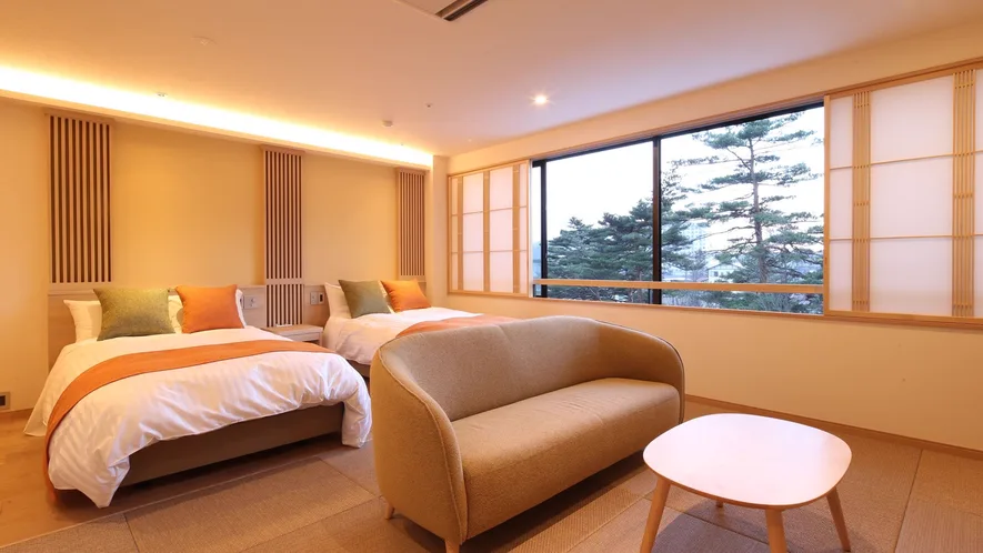 Hotel Sakurai’s bath facilities, shown on a booking-site property page