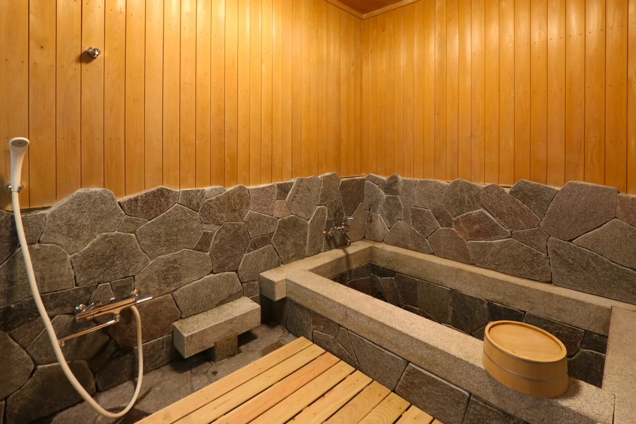 Private natural hot-spring bath in a detached villa at Beppu Showaen